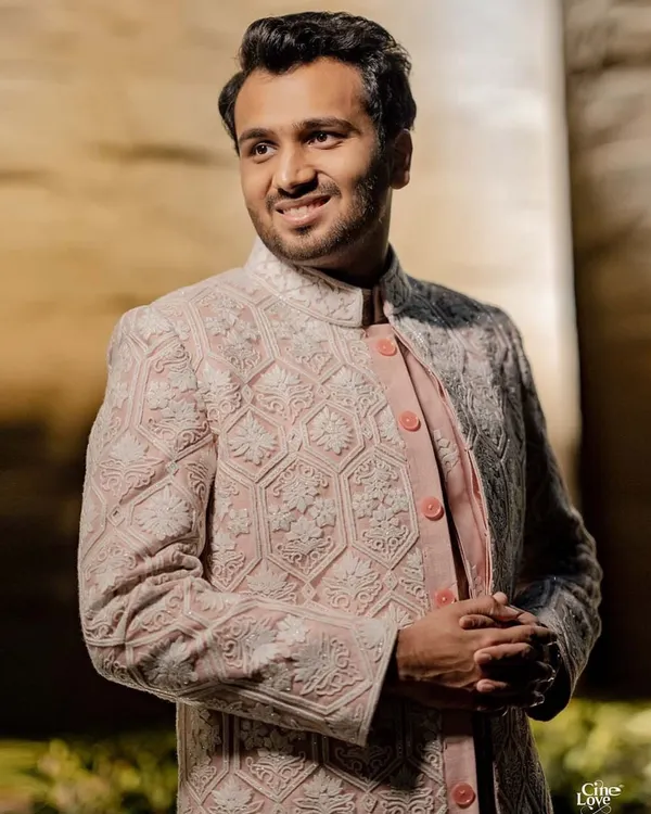 For his Godh ceremony, we styled Labhya in an elegant pink and white Manish Malhotra sherwani. The intricate thread work and soft color palette created a look of refined sophistication.