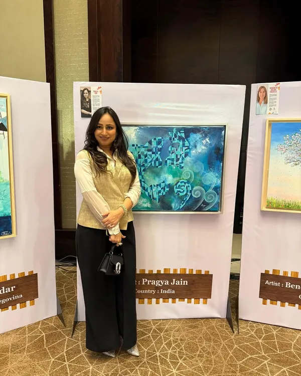 Standing with my painting at the SDGs Through Arts exhibition in India. Being part of a United Nations and UNESCO affiliated event was a significant moment for me, connecting my art to a global conversation.