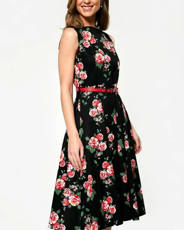 Our black floral A-line dress is a timeless choice for daytime events, brunches, or semi-formal parties. The classic cut is flattering on many body types, and the rose print adds a touch of romantic charm.