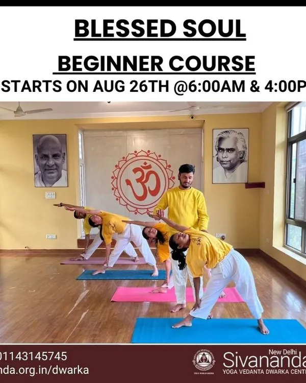 A snapshot from our beginner course, where an instructor guides students in Trikonasana (Triangle Pose). We emphasize correct form to build a strong and safe foundation for your yoga journey.