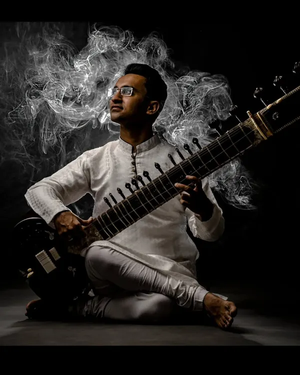 A portrait capturing the soul of my music, blending traditional form with a contemporary artistic vision. This image reflects the deep focus and passion I bring to every performance, whether classical or modern.