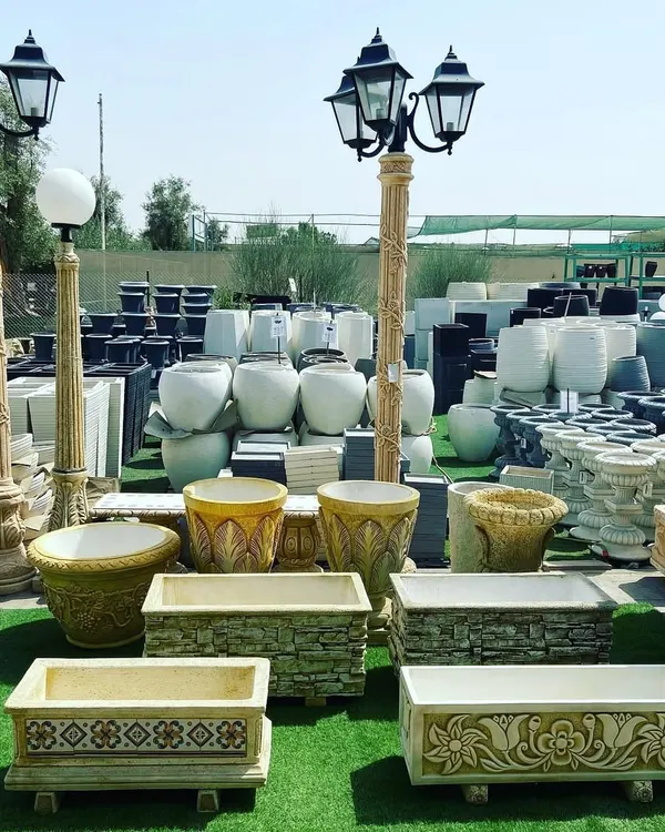 A selection of the high-quality planters, pots, and garden lighting we offer. We have a wide range of materials, from ornate stone planters to modern ceramic pots and classic lampposts, to suit any garden style.