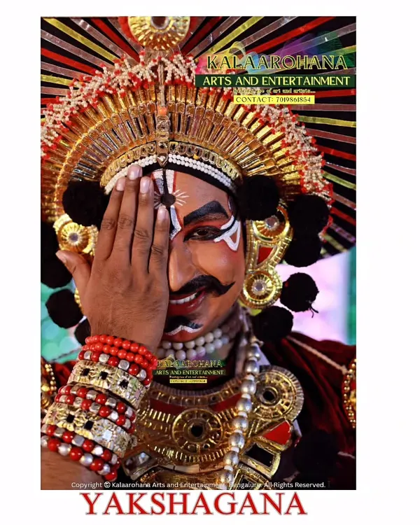 The expressive power of a Yakshagana artist is captured in this moment. The detailed face paint and intense gaze are central to conveying the story and character's emotions, a hallmark of our authentic performances.