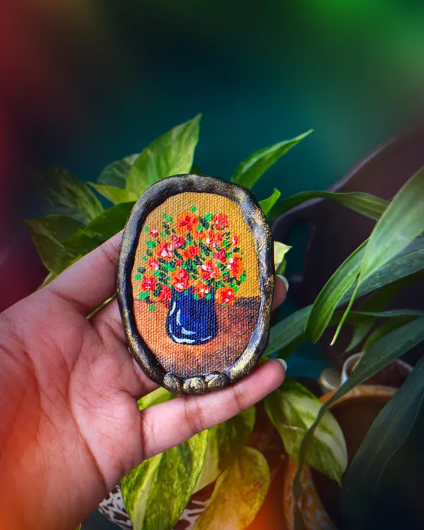 This hand-painted floral magnet is a perfect example of the art I love to create. Each piece is a tiny canvas, complete with a hand-shaped clay border, designed to bring a little bit of beauty to your everyday spaces.