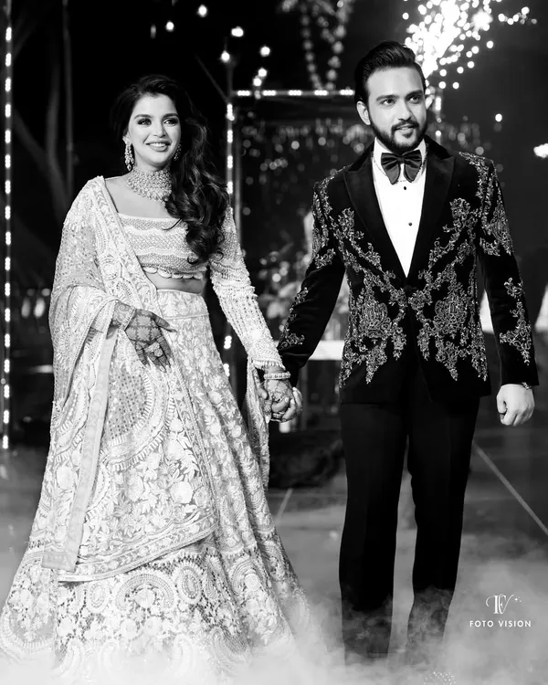 Arshi and Ashish make their grand entrance, hand in hand, with sparklers lighting their way. We capture the drama and excitement of your entrance, setting the tone for a night of celebration.