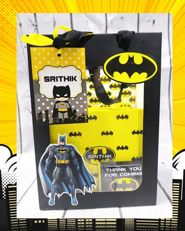 This custom Batman-themed gift bag is perfect for a superhero party. It features a personalized tag and the iconic Bat-Signal, ready to be filled with goodies.