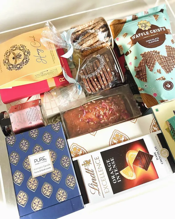Our most exquisite creation, a custom-made acrylic trunk for a very special occasion. This luxury hamper features items from Ladurée, Pure Home & Living, Lindt, and Sancha Tea.