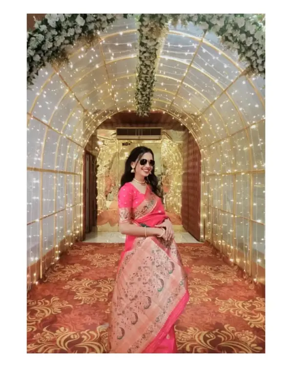 A full-length view of my attire for a recent wedding sangeet performance. The vibrant pink saree and elegant styling were chosen to match the festive and celebratory atmosphere of the event.
