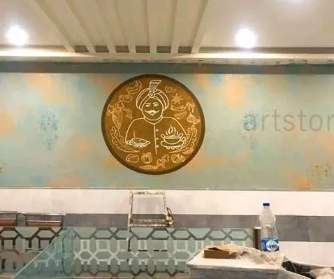 We hand-painted this custom logo for a restaurant directly onto the textured wall. This is a great way for businesses to incorporate their branding into their interior design in a unique and artistic way.
