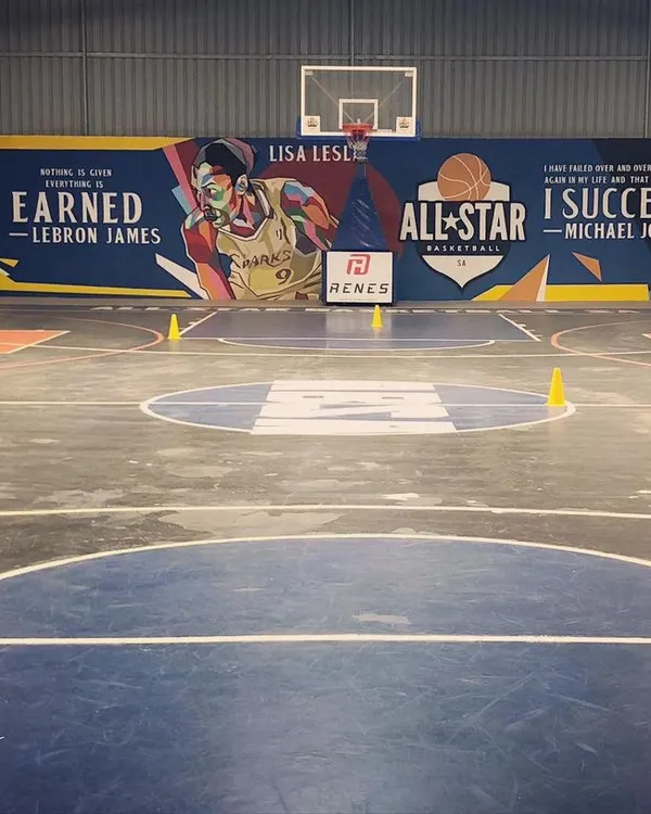 Our court, ready for action. The mural featuring LeBron James, Lisa Leslie, and Michael Jordan serves as a constant reminder of what can be achieved with hard work.