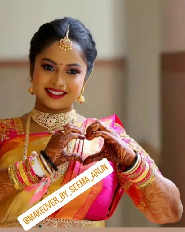 This is the classic South Indian bridal look I love to create. The focus is on radiant skin with HD makeup that looks flawless, paired with a bright lip and defined eyes that beautifully complement the traditional gold jewellery and silk saree.
