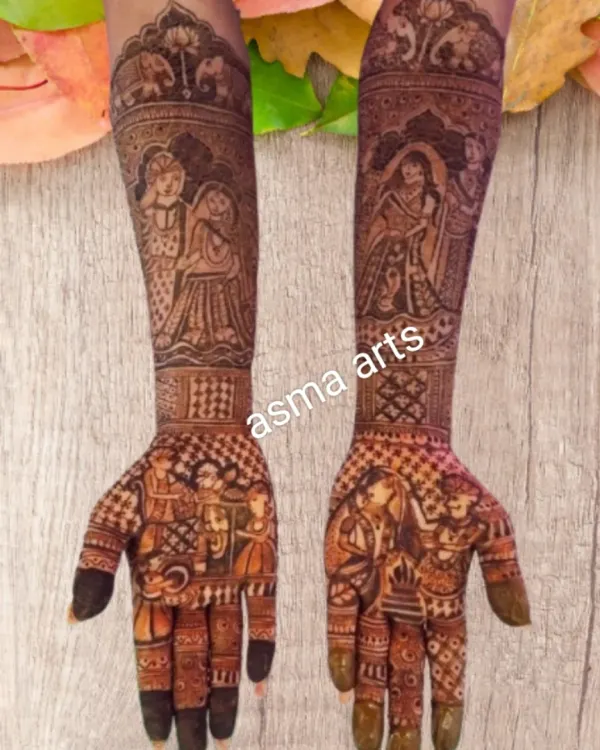 For this bride, I created a full narrative on her arms, with portraits of the couple, scenes from a traditional Indian wedding ceremony, and decorative elephants. This is my favorite way to make bridal henna truly personal and unforgettable.