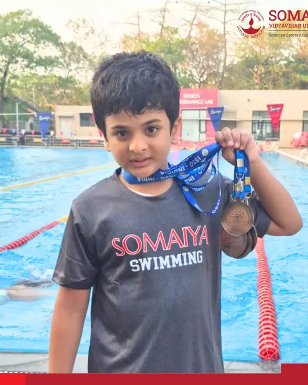Young swimmer Vrishin Hingwala proudly displays his four bronze medals won at the U-9 ISSO Mumbai Regional Games.