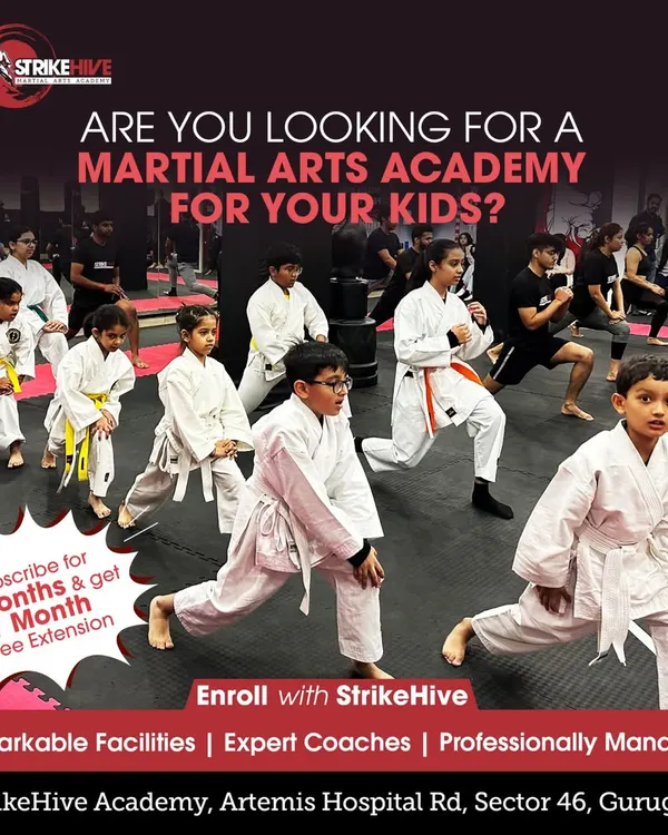 Are you looking for a martial arts academy for your kids? Our program offers expert coaching and remarkable facilities to help your child grow. This image shows our young students during a warm-up lunge.