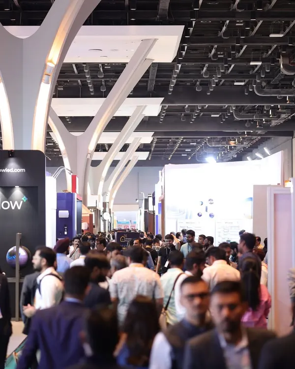 The expansive halls of the Jio World Convention Centre filled with attendees, showcasing the immense scale and draw of India's largest smart home technology event.