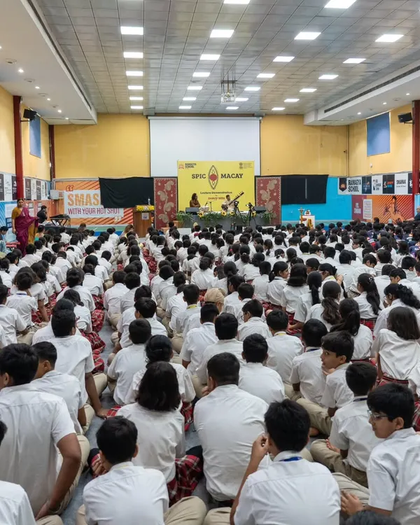 A wide view of the auditorium at Ramagya School, filled with students during a SPIC MACAY lecture-demonstration. It is always inspiring to perform for such a large and attentive young audience.
