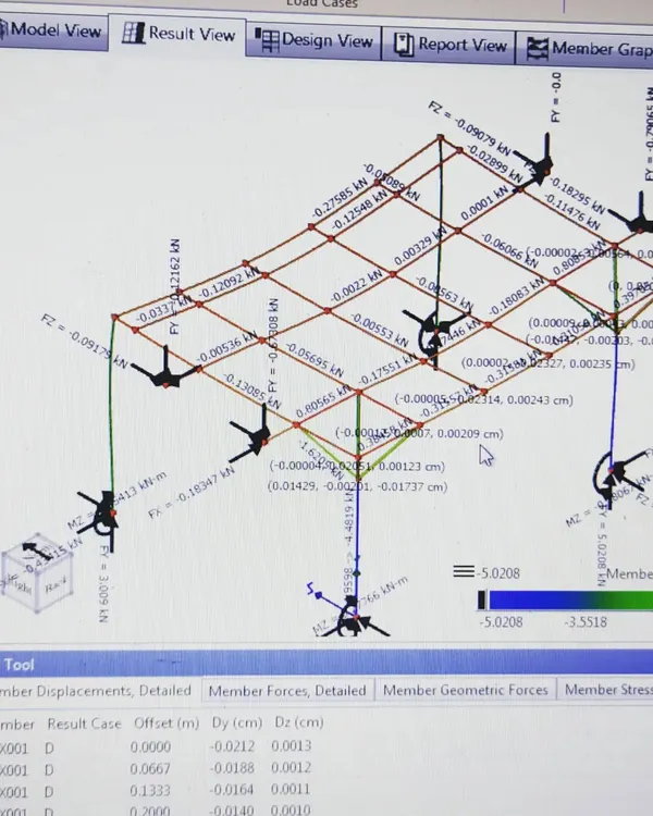Every project begins with rigorous engineering. This screen shows a structural stress analysis for a steel frame, where we calculate loads and forces to ensure every structure we build is safe, stable, and built to last.