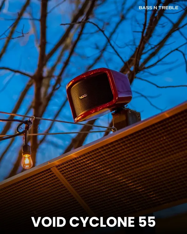 This vibrant red Void Cyclone 55 outdoor speaker adds a pop of color and powerful sound to this terrace setup. It's designed to be completely weatherproof, so the music plays on, no matter the forecast.