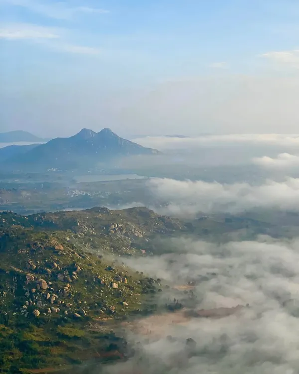 A classic Skandagiri view. On most mornings, you get to stand on the peak and watch the clouds stretch out below you like a vast, white ocean.