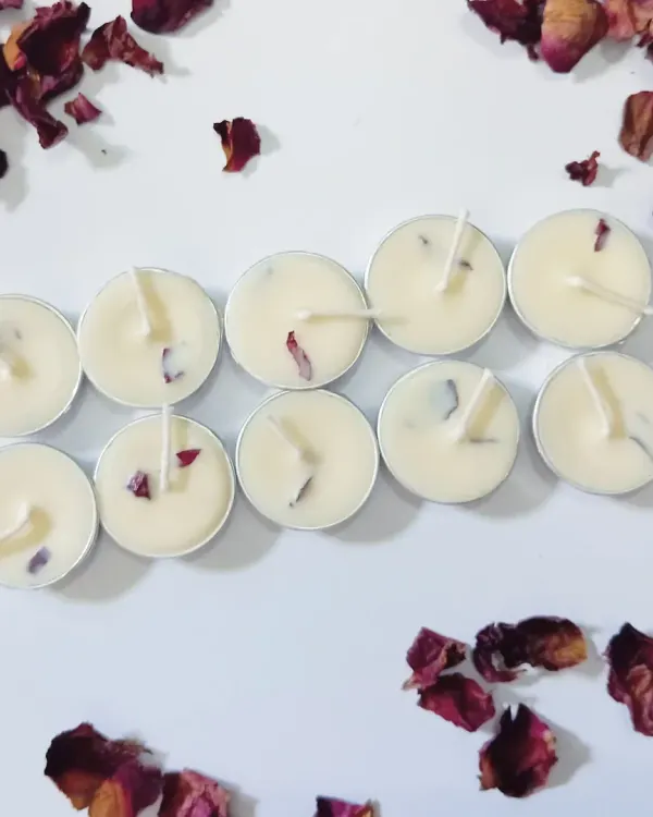 Petals of love and light of joy. This is my pack of ten air-dried rose petal tealights, arranged neatly to show the delicate botanical touch in each one.