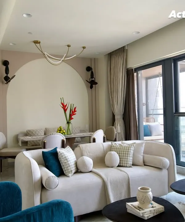 This is what I call turning a house into a home. This living room, once a bare shell, is now a warm, inviting space filled with soft textures, calming colors, and personal touches. It’s a perfect example of my design philosophy: creating a sanctuary that feels genuinely yours.