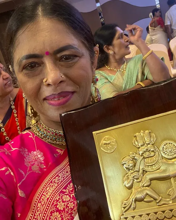 A proud moment for me, holding our first-place award from the Gowda Princess fashion show. This was all about celebrating powerful women.