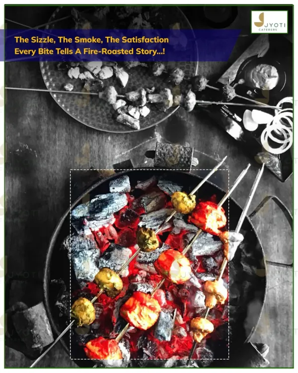 The sizzle and smoke of a live tandoor station. Here, skewers of paneer and mushroom tikka are fire-roasted over hot coals, delivering authentic flavour in every bite.