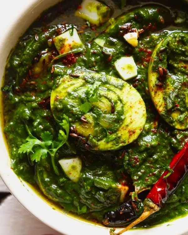Wholesome comfort in a bowl. My Spinach Egg Curry is where health meets flavor, with boiled eggs simmered in a rich and nutritious spinach gravy. It's perfect with rice or roti.