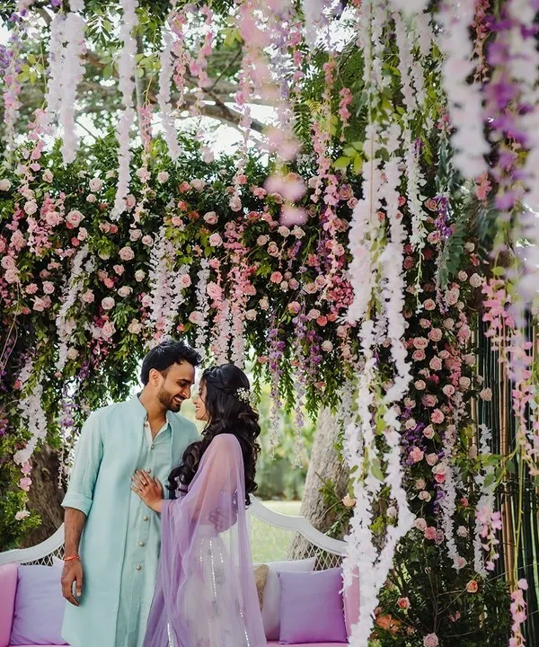 We create dreamscapes where your love story can unfold, like this enchanting floral canopy designed for a truly magical moment.