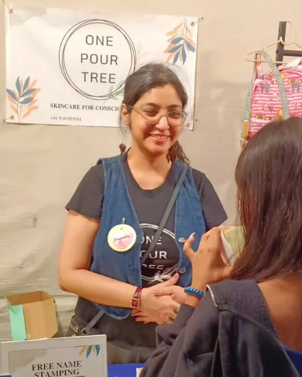 A candid moment of conversation with a customer at the Golden Spiral Fair. These interactions are why I do what I do.
