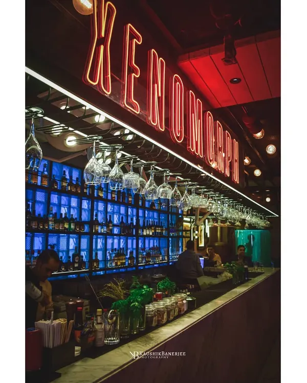 Capturing the electric mood of a bar at night. I use a mix of ambient and artificial light to highlight the key features, from the glowing neon signs to the fully stocked bar, creating an image that invites customers in.