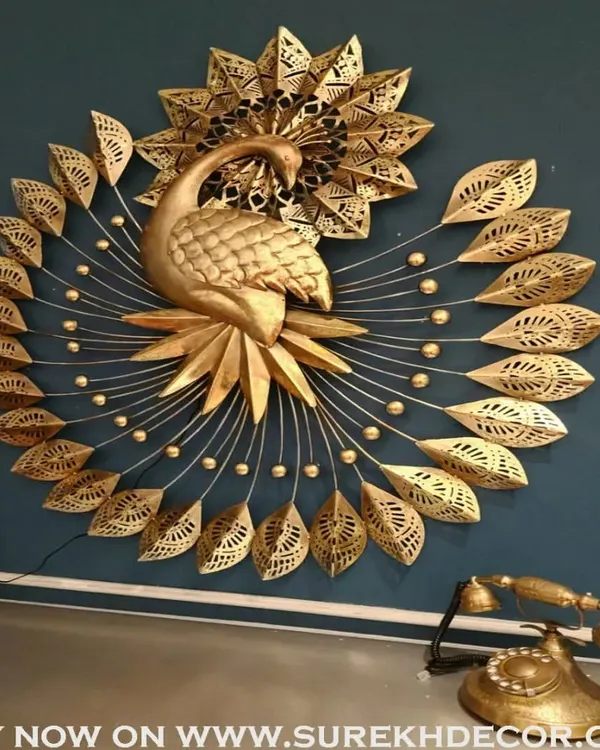 This stunning peacock metal wall art is a true showstopper, featuring intricate feather details and a graceful form. The antique finish and built-in LED lights create a warm, inviting glow, making it a luxurious centerpiece for any room.