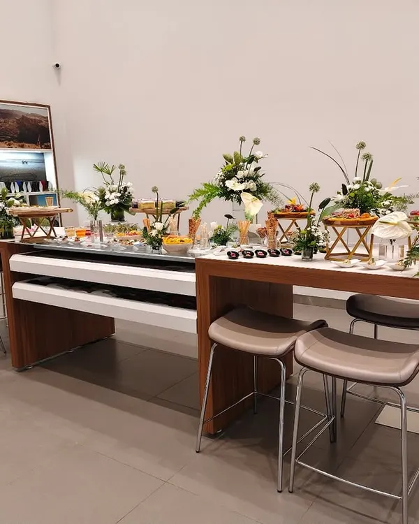 We believe food should be a centerpiece of any celebration. This artistic grazing table, complete with fresh florals and an array of gourmet bites, shows how we turn catering into a full sensory experience for corporate events and private parties.