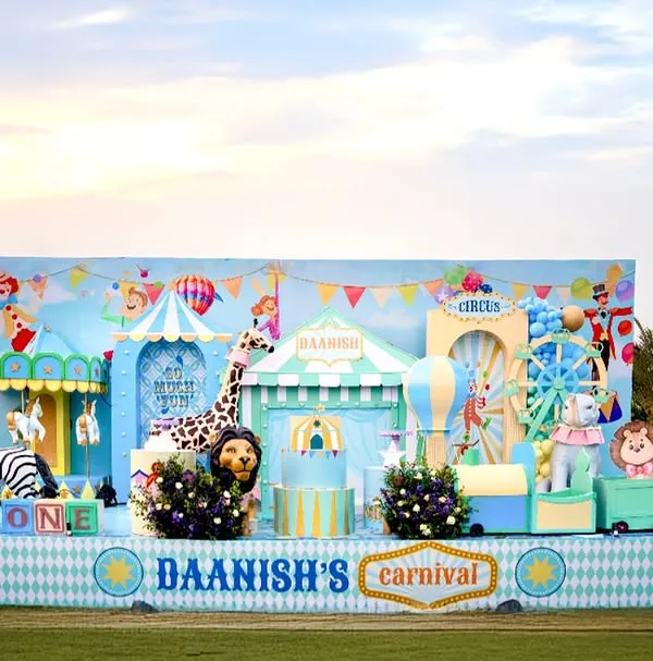 Welcome to a world of wonder! This wide-angle shot of Daanish's pastel carnival shows the grand scale of the custom backdrops, life-sized animal props, and cohesive event design my team and I deliver. I handle every detail to create a truly immersive experience.
