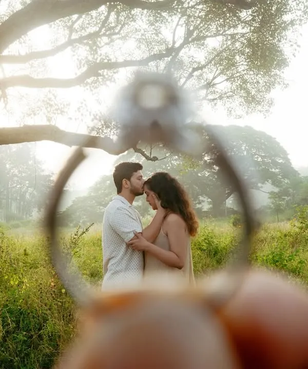 This shot captures the promise of a lifetime together. I love finding creative ways to frame a moment, and for this pre-wedding shoot, we used the engagement ring to create a unique and personal portrait that feels both intimate and epic.