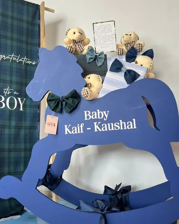 This custom-built rocking horse hamper, designed for a very special baby boy, is filled with beautifully wrapped gifts and adorable teddy bears. It's a perfect example of how I turn a gift into a timeless nursery keepsake.