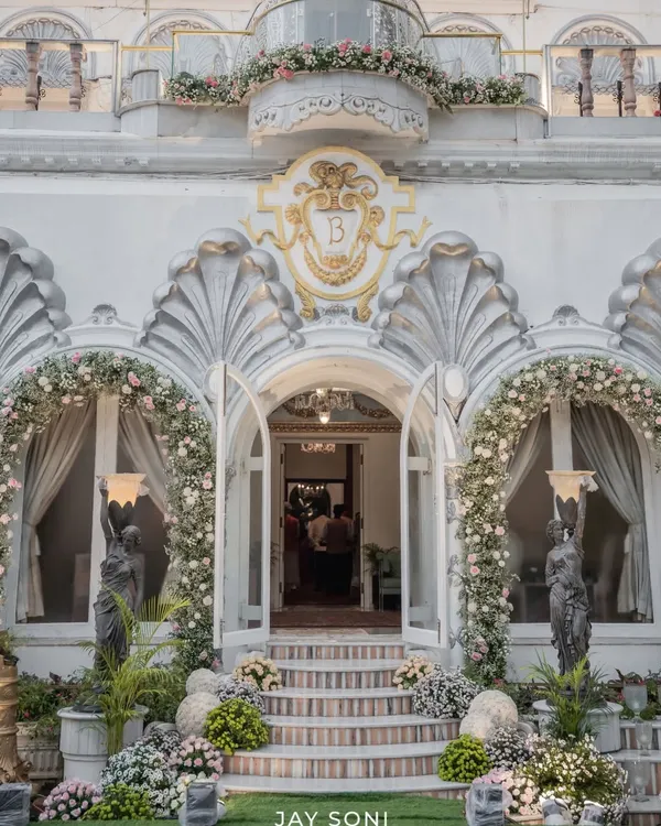 When the decor at the entrance is this stunning, you know the celebration inside is next level. I designed this grand floral entrance to welcome guests to the Birla wedding with elegance and opulence.