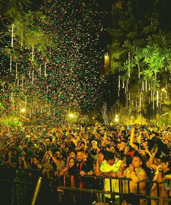 A massive confetti drop over a crowd of thousands during my New Year's Eve set at The Lalit Ashok, Bangalore. This is the kind of epic, high-energy moment I love creating for large-scale events.