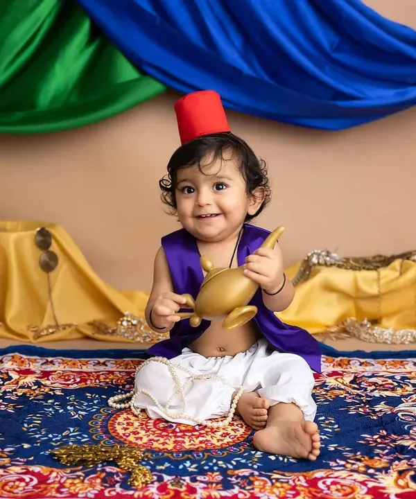 Every smile is a wish come true with this little Aladdin! This themed sitter session is complete with a magic lamp, a flying carpet, and a whole lot of charm.