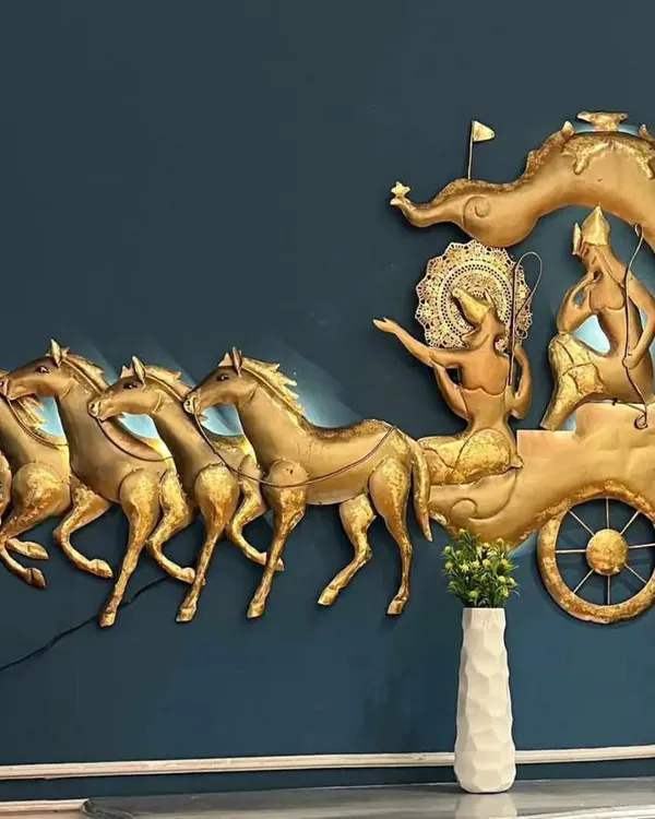 This magnificent Arjun Rath metal wall art is a true masterpiece, handcrafted by our skilled artisans. The antique golden finish and integrated LED backlighting create a divine and dramatic focal point, perfect for a living room or entryway, blending spiritual significance with luxurious design.