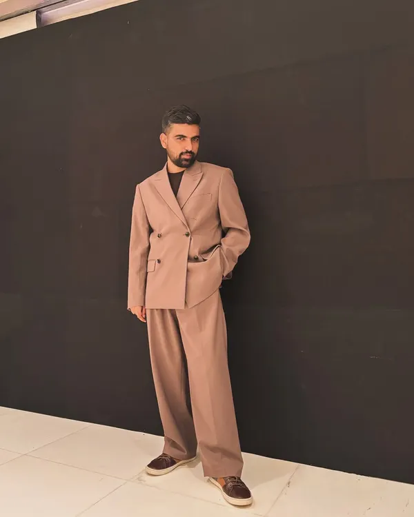 My look for an awards event. I chose a relaxed, double-breasted suit in a muted tone, reflecting my preference for modern, minimalist tailoring.