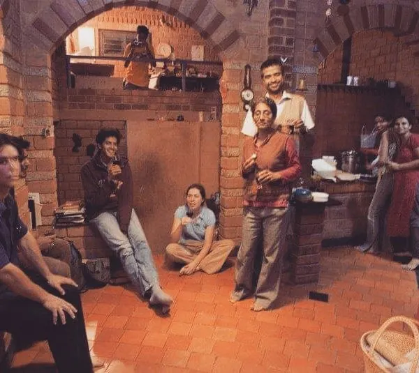 A photo from our archives, showing our young team sharing a meal in the basement of the Sans Souci house, which served as our first office. Our conversations, even then, were always about design, water, and ecology.