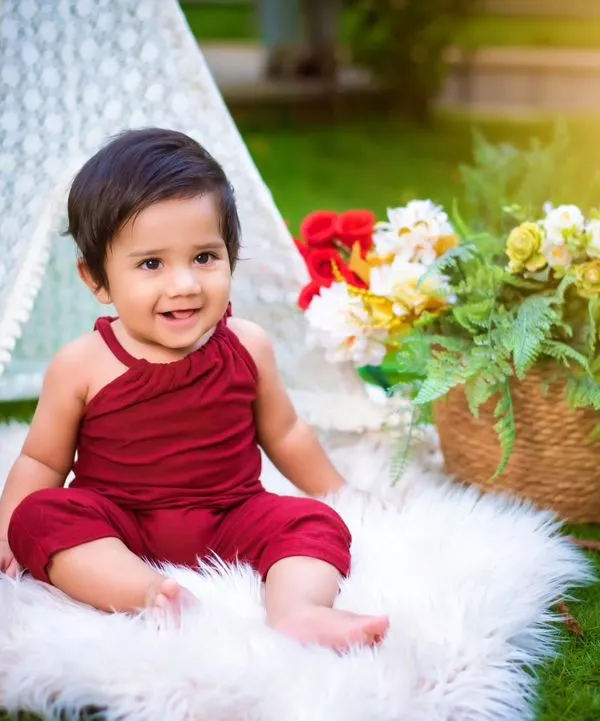A beautiful sitter session in a lovely outdoor setting. The natural light and greenery create a soft and dreamy feel, perfect for capturing your baby's sweet personality.