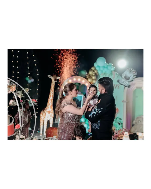 A sweet moment of the birthday boy getting his first taste of cake from his mom. I love capturing these candid, love-filled moments during birthday party celebrations.