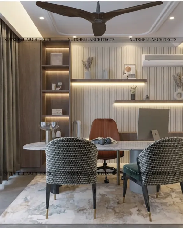 This sophisticated home office is designed for focus and productivity. It features a marble-topped desk, elegant seating for client meetings, and a backdrop of fluted panels and backlit shelving for a touch of modern elegance.
