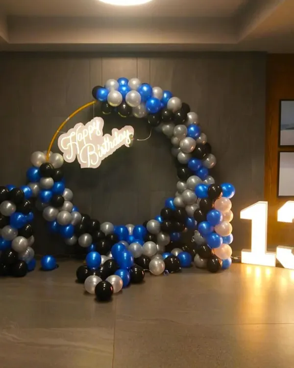 I provide large, light-up marquee numbers, like this number '13', perfect for milestone birthdays. They create a great photo opportunity and add a professional touch to your party decor.