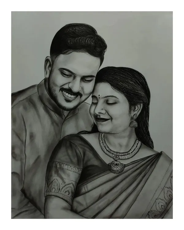 A romantic charcoal portrait of a couple. The black and white medium creates a feeling of timeless elegance, perfect for an anniversary gift.