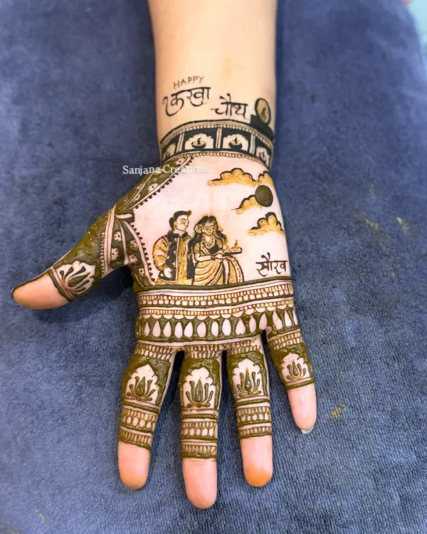 This Karwachauth design was extra special. It features a detailed portrait of the couple, with the husband's name, 'Saurav', written beautifully. It’s these personal touches that make the art meaningful.