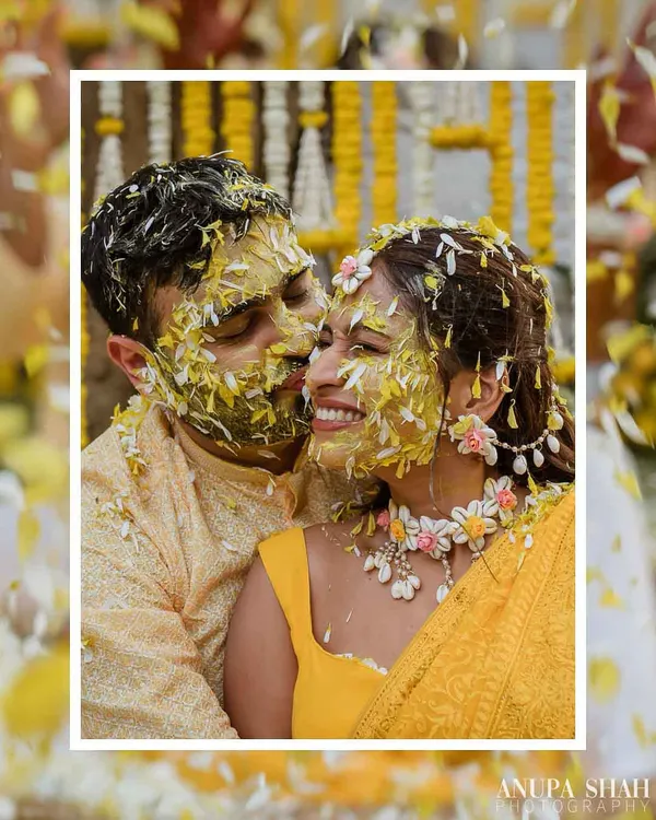 A Haldi ceremony filled with sunshine and laughter. We created a beautiful backdrop of marigolds and tuberoses, perfect for capturing these moments of pure joy.