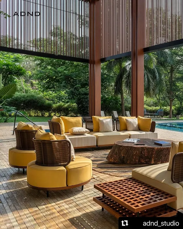 We believe a home should merge with its surroundings. This veranda, the social heart of the K House, opens completely to the poolside and tropical gardens, blurring the line between indoors and out to create a space for effortless living and entertaining.